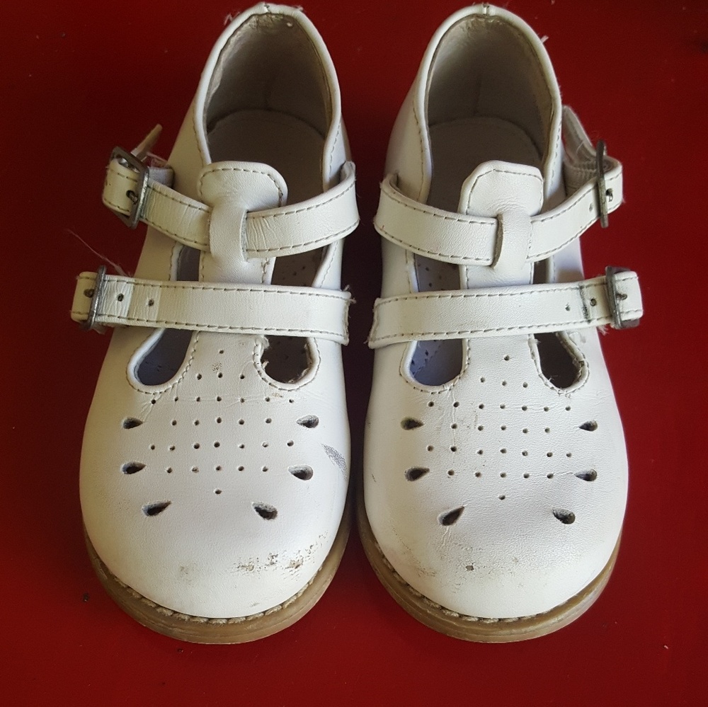 Lightly worn, white willits  with cut out detail